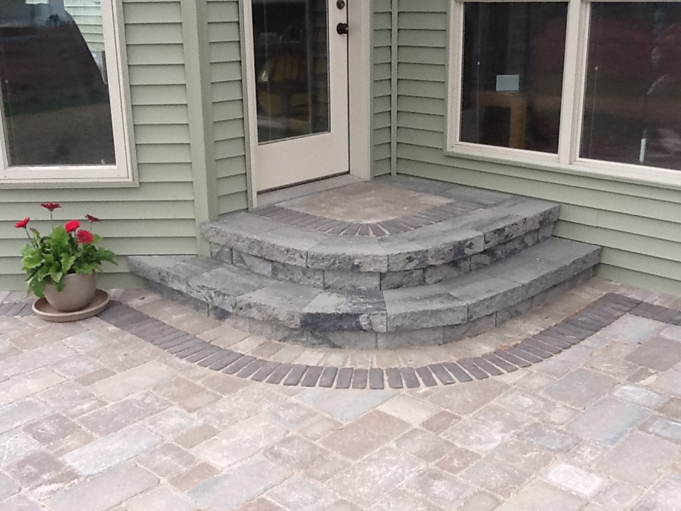 rounded steps in a corner in front of back door